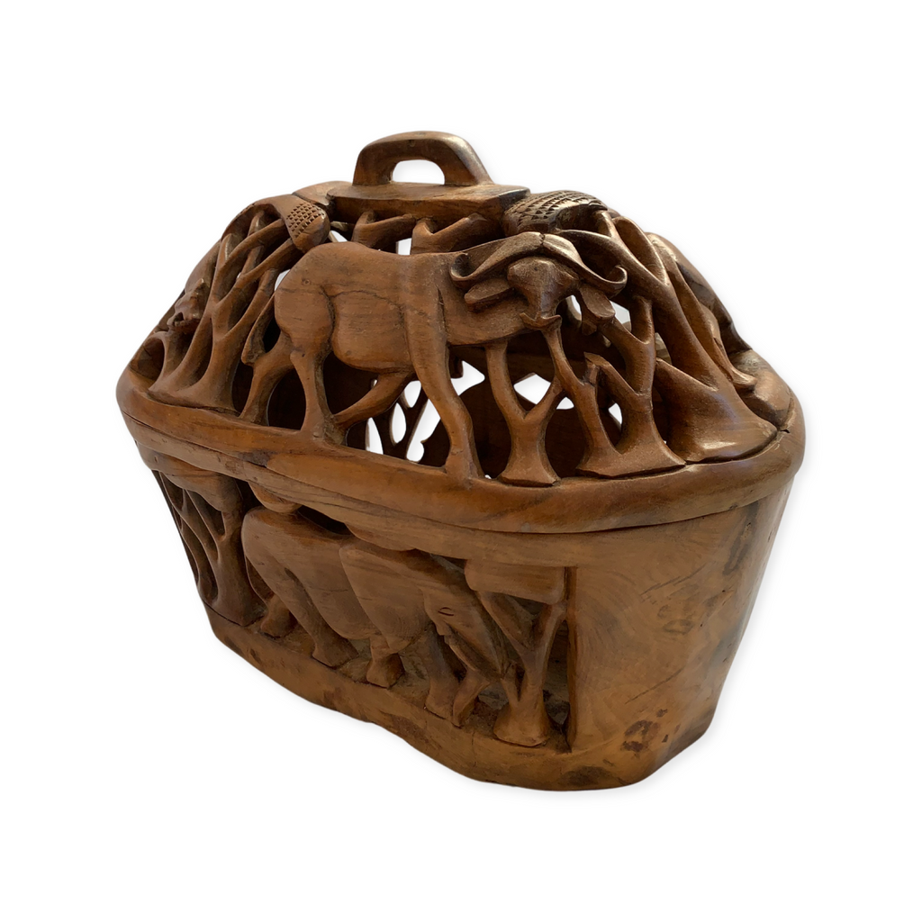 Smaller hand-carved wooden fruit bowl.